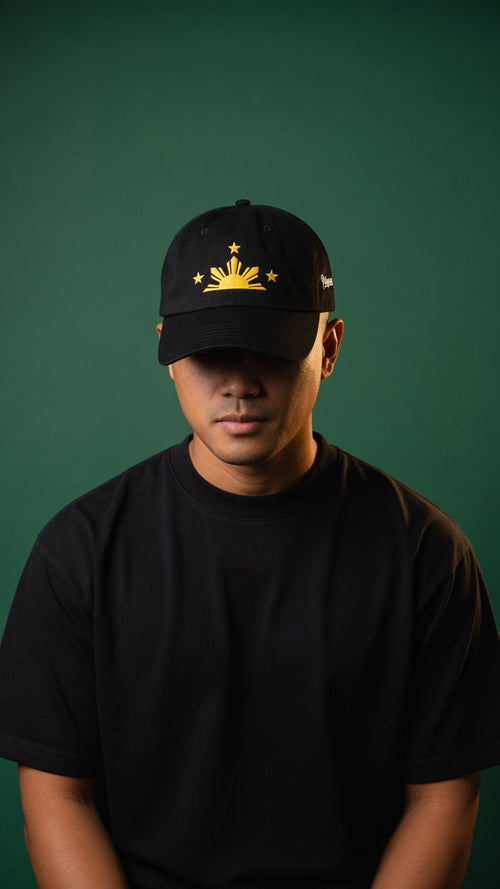 Wearing the black Three Stars & Sun Script Hat