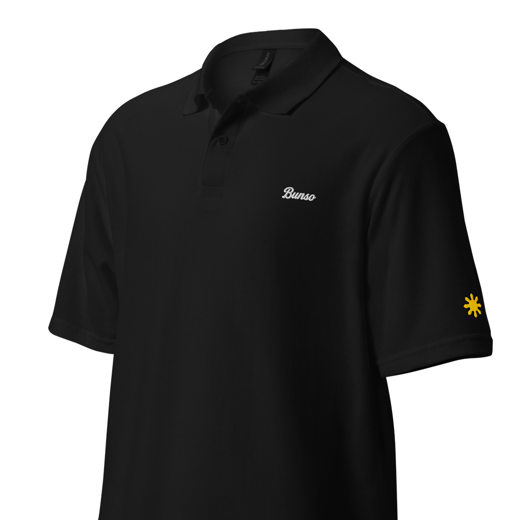 Bunso (Youngest) polo, Black, angled view with gold sun on sleeve