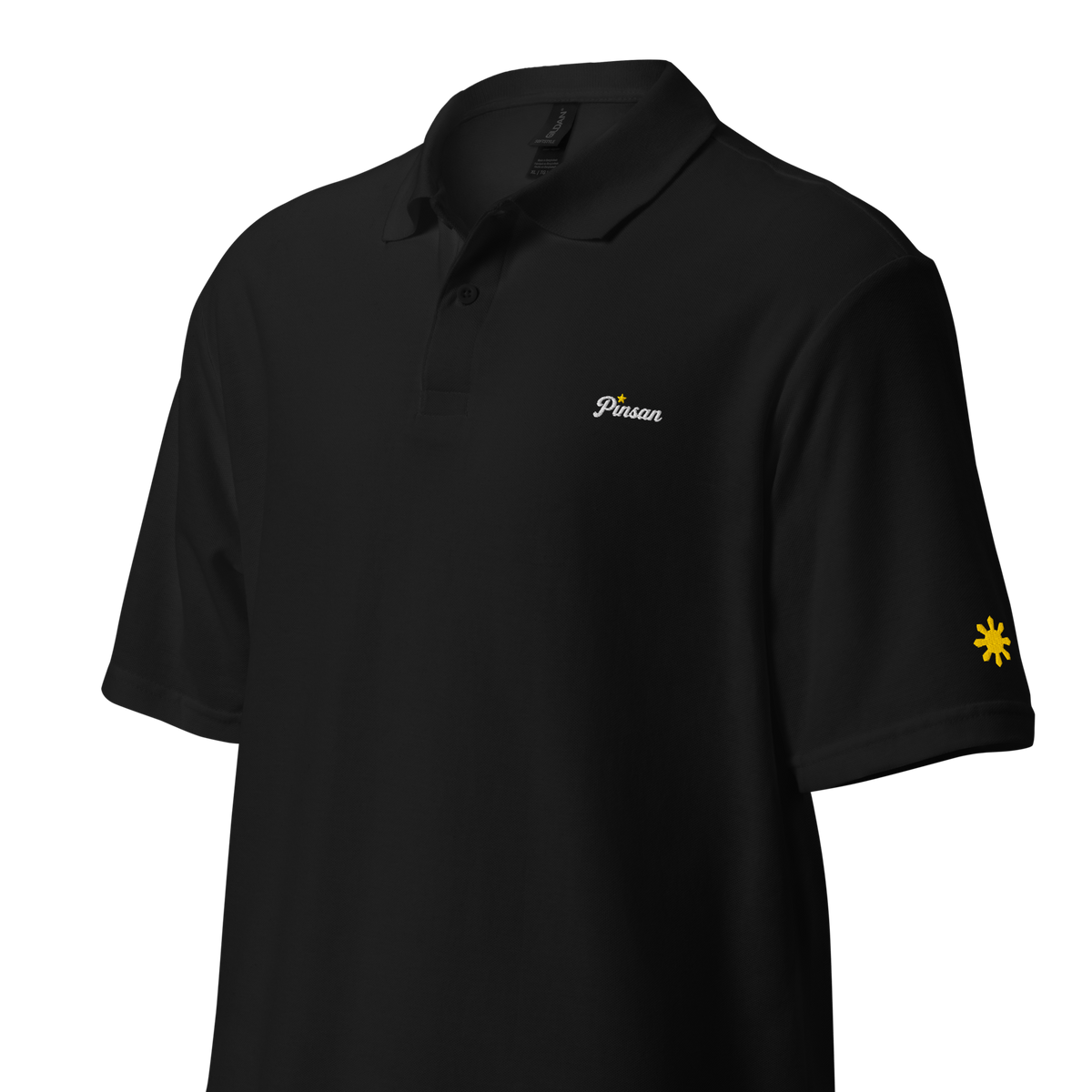 Pinsan (Cousin) polo, Black, angled view with gold sun on sleeve