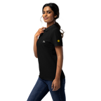 Tita (Auntie) women’s polo, Black, model, left side with gold sun on sleeve