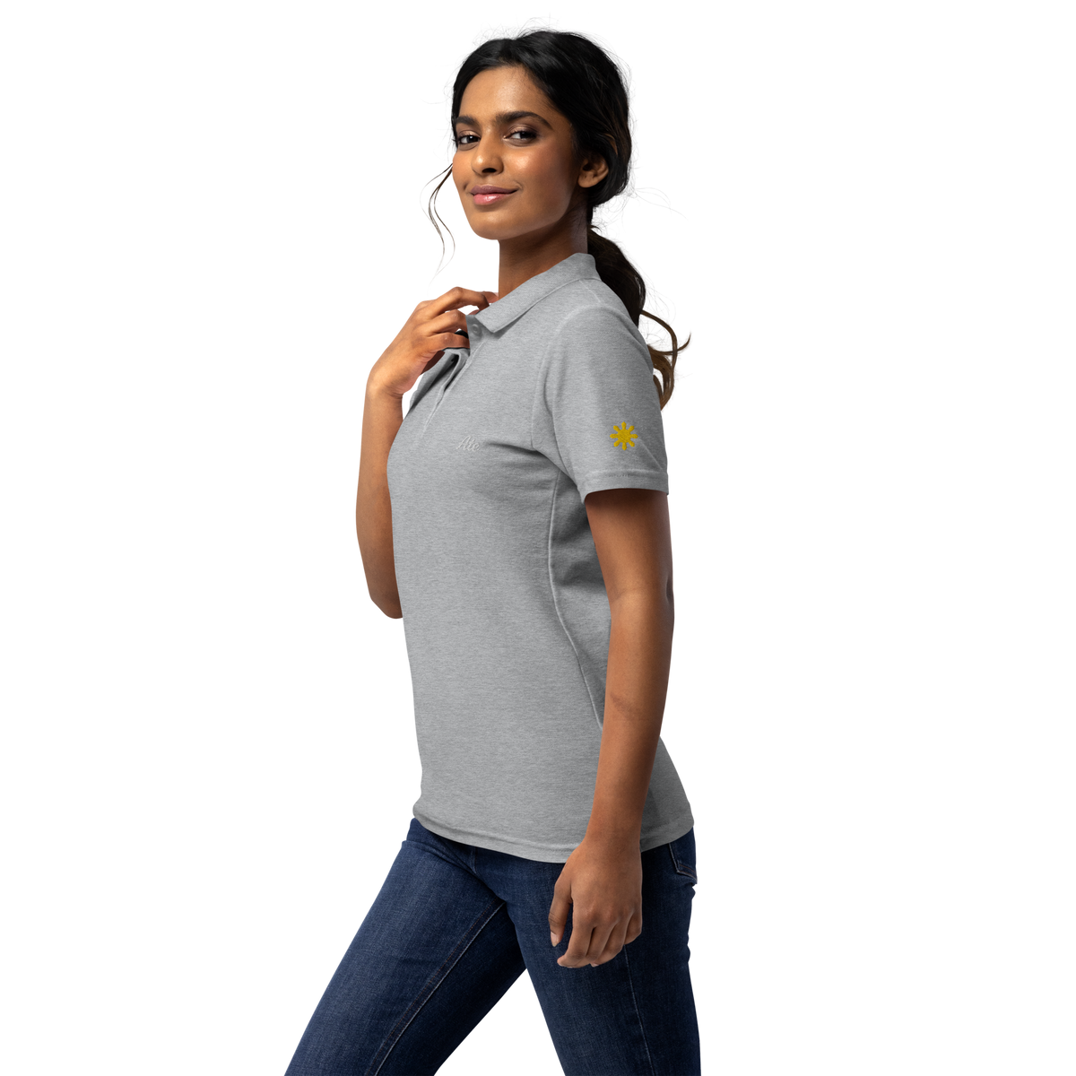 Ate (Eldest Sister) women’s polo, Sport Grey, model, left side with gold sun on sleeve